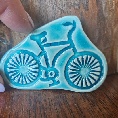 Bike brooch