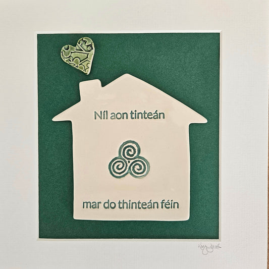 Framed Home tile with triskele